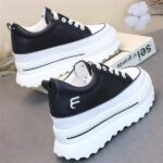 Women's white leather sneakers - Image 2